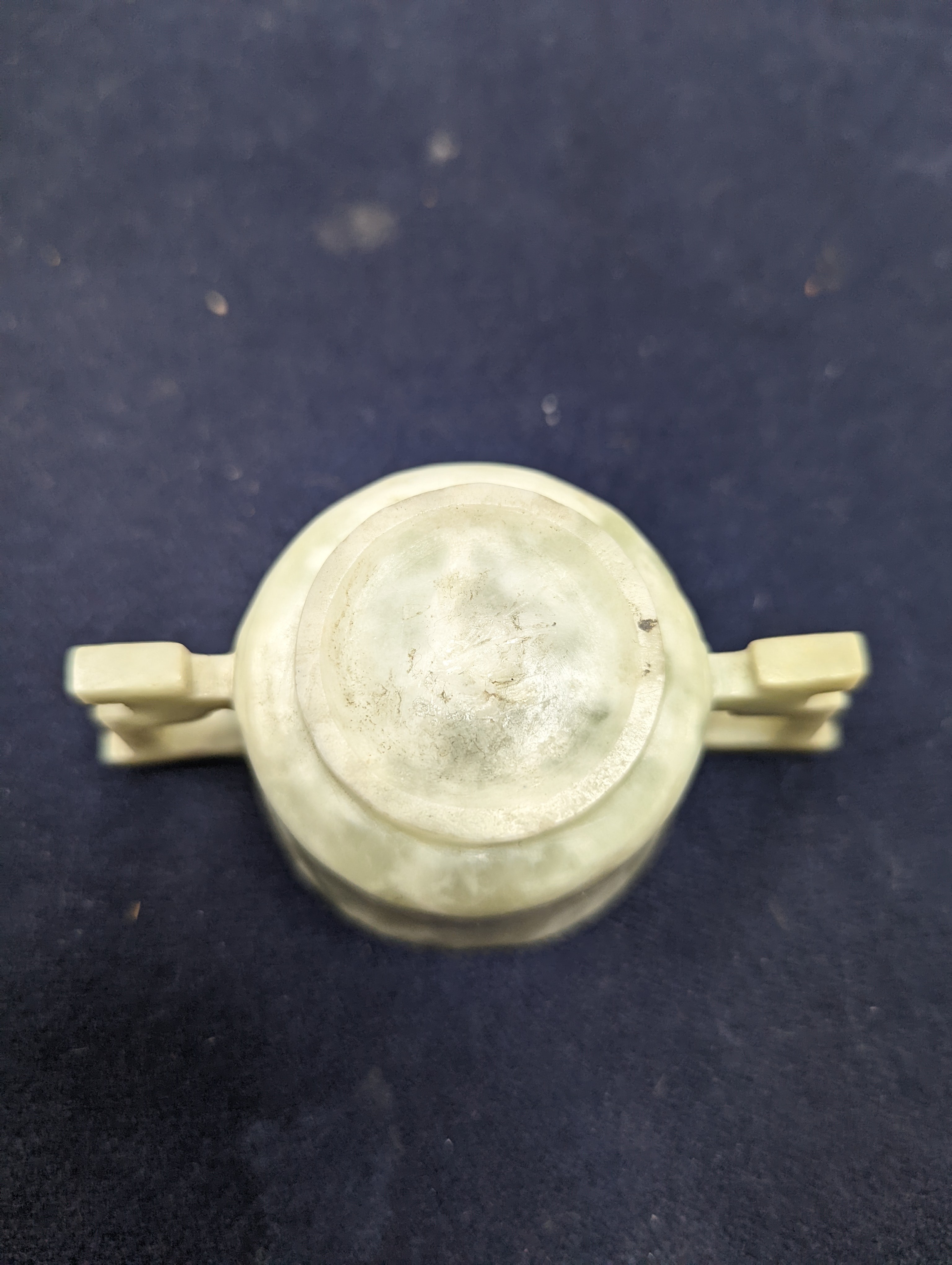 A Chinese jade belt hook, 12.5cm an archer's ring and figure, a stone cup and a glass snuff bottle